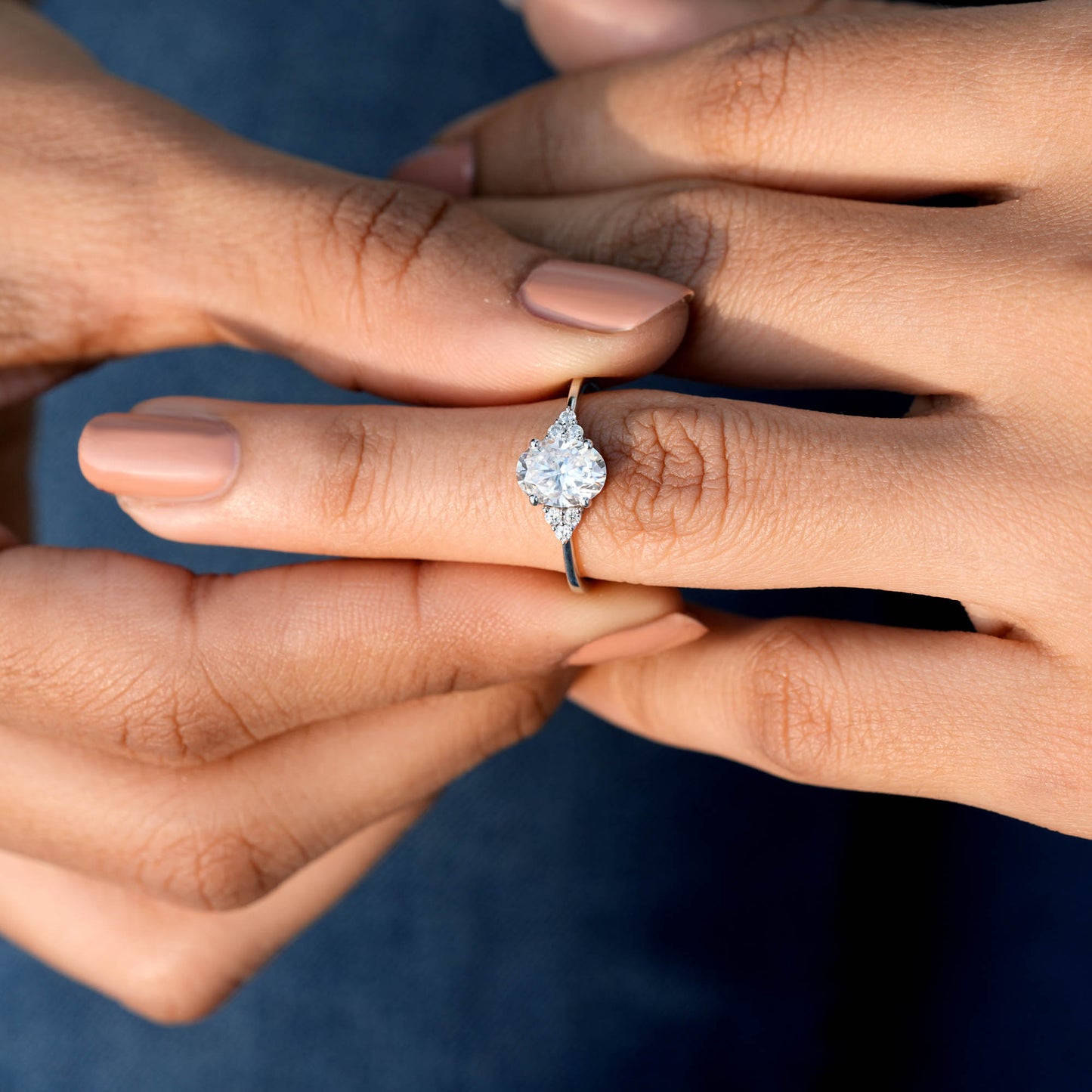 Oval Cut Diamond Gold Ring with Side Stones