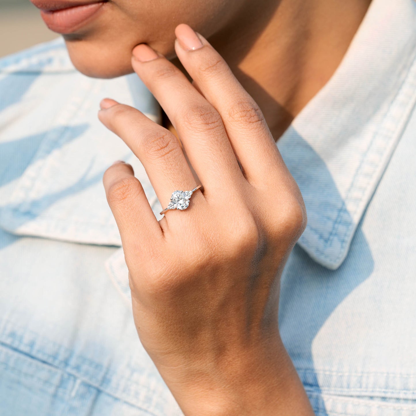 Oval Cut Diamond Gold Ring with Side Stones