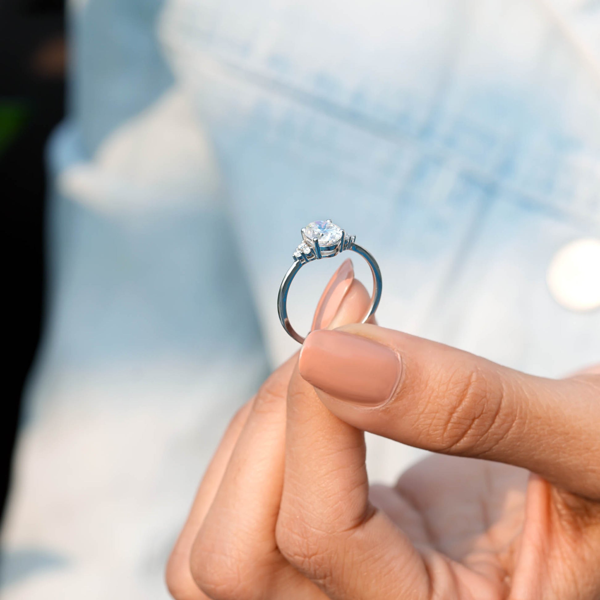 Oval Cut Diamond Gold Ring with Side Stones