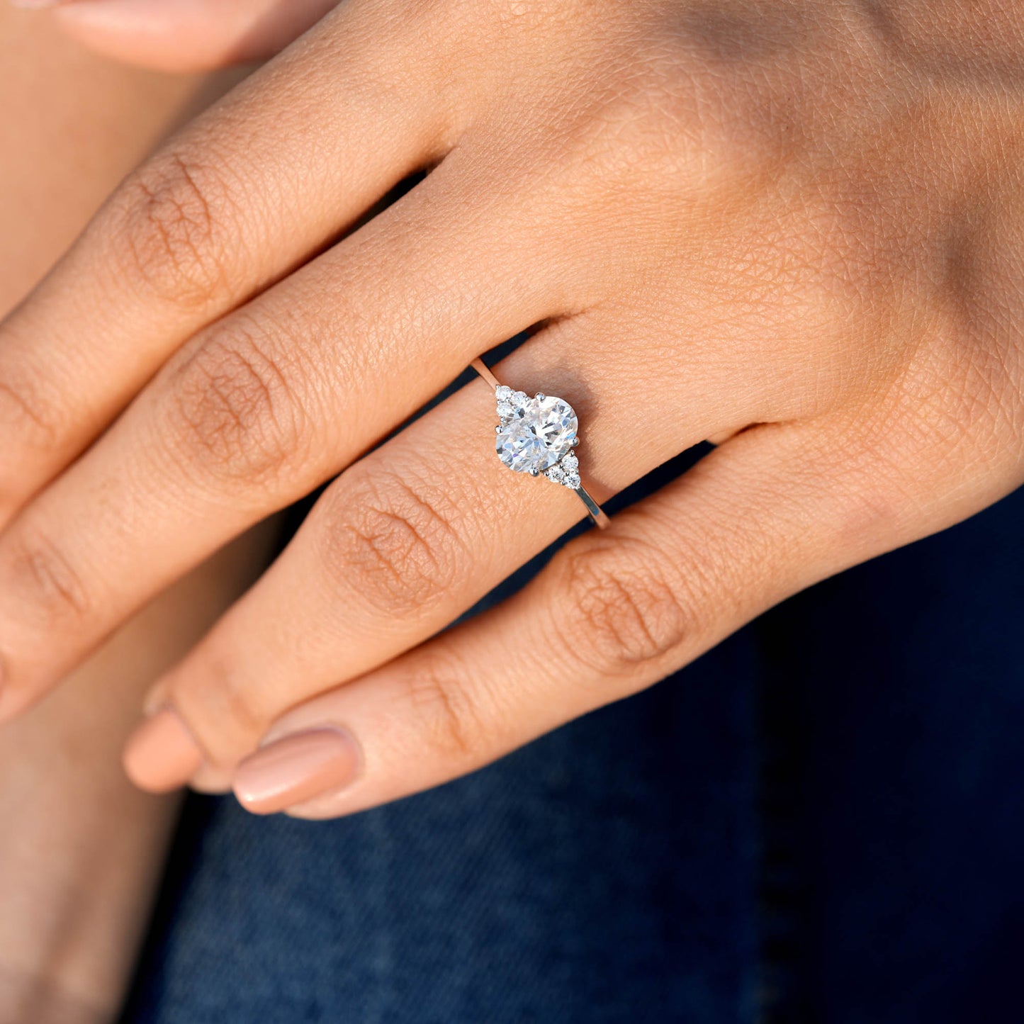 Oval Cut Diamond Gold Ring with Side Stones