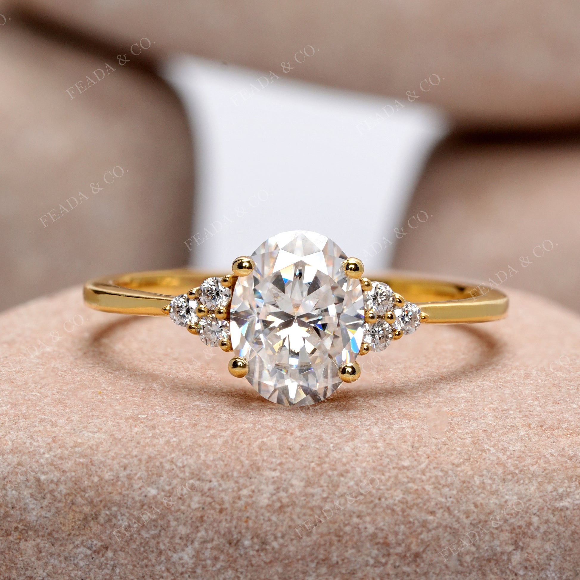 Oval Cut Diamond Gold Ring with Side Stones