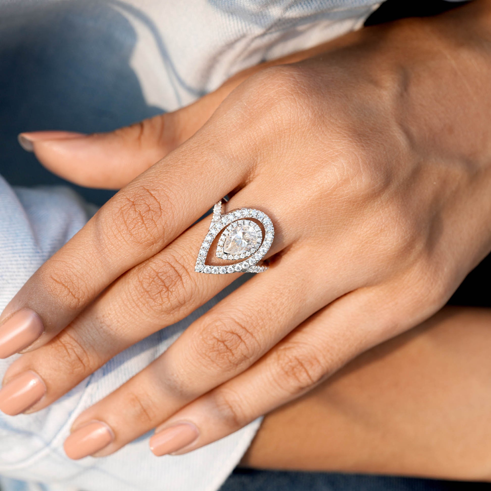 2.25 CT Pear, Round Cut Colorless Engagement Ring