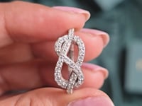 0.59 CT Round Cut Colorless Engagement Ring