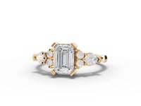Emerald Moissanite Diamond Ring With Pear Cluster Accents